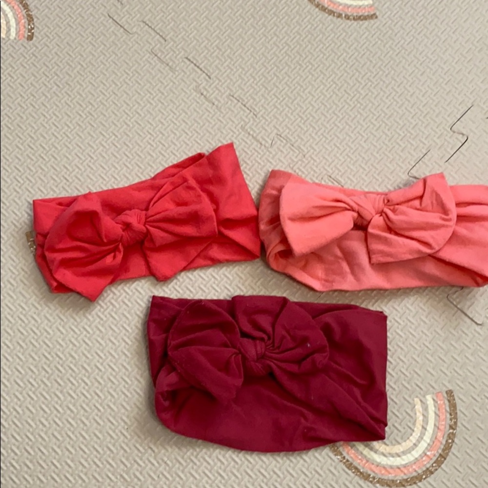Three red/orange tone headbands